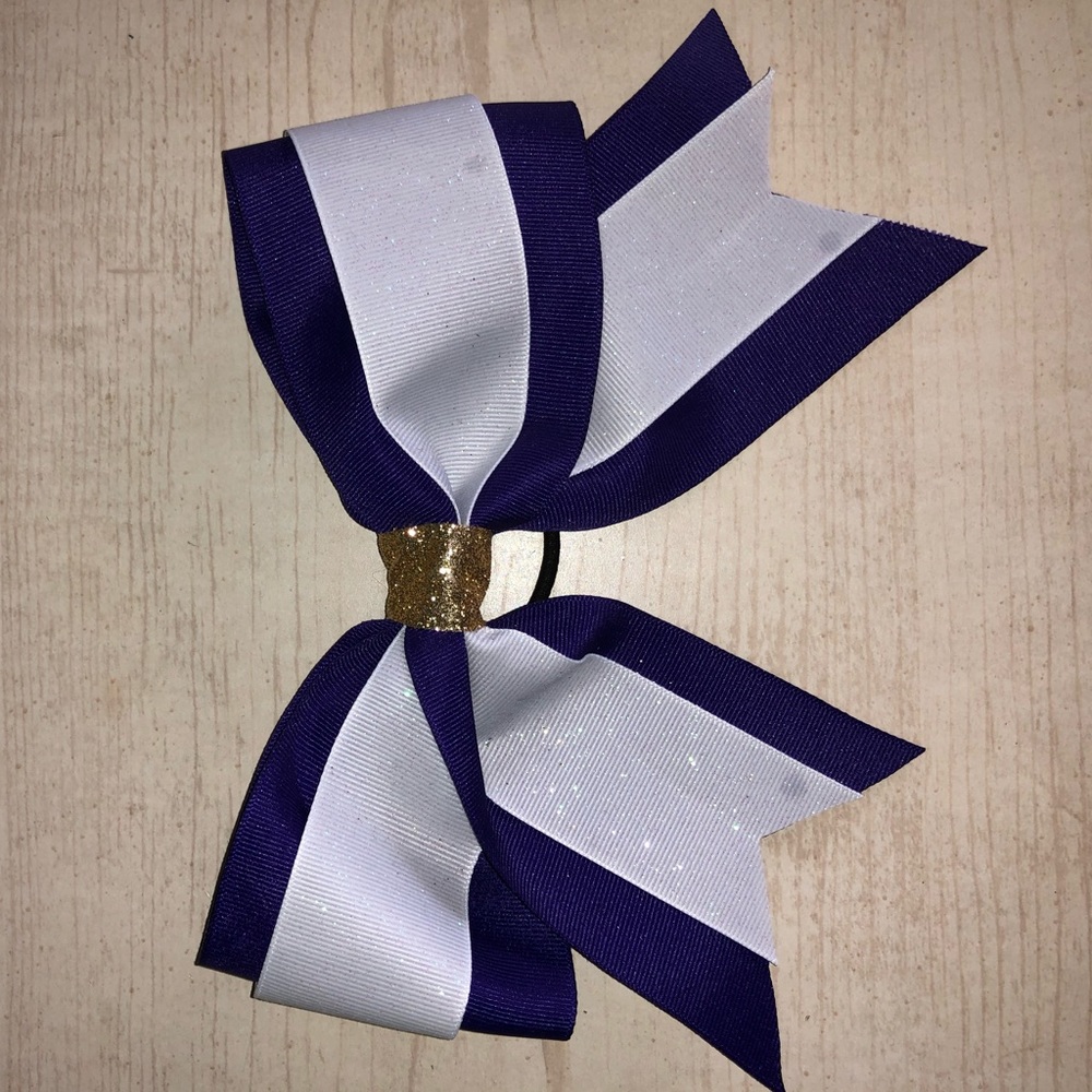 purple, white cheerleading bow